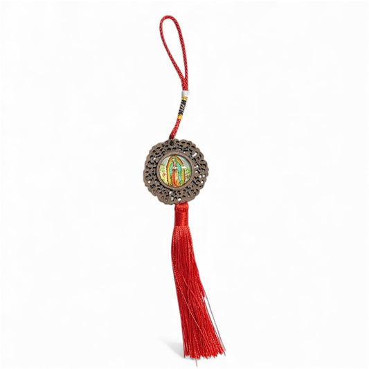 Round wooden hanging ornament with the image of Our Lady of Guadalupe