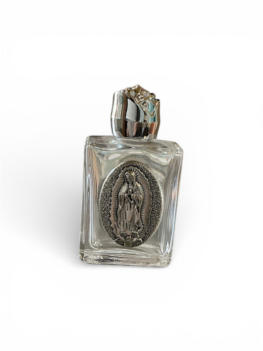 glass bottle of holy water with the image of the Virgin of Guadalupe